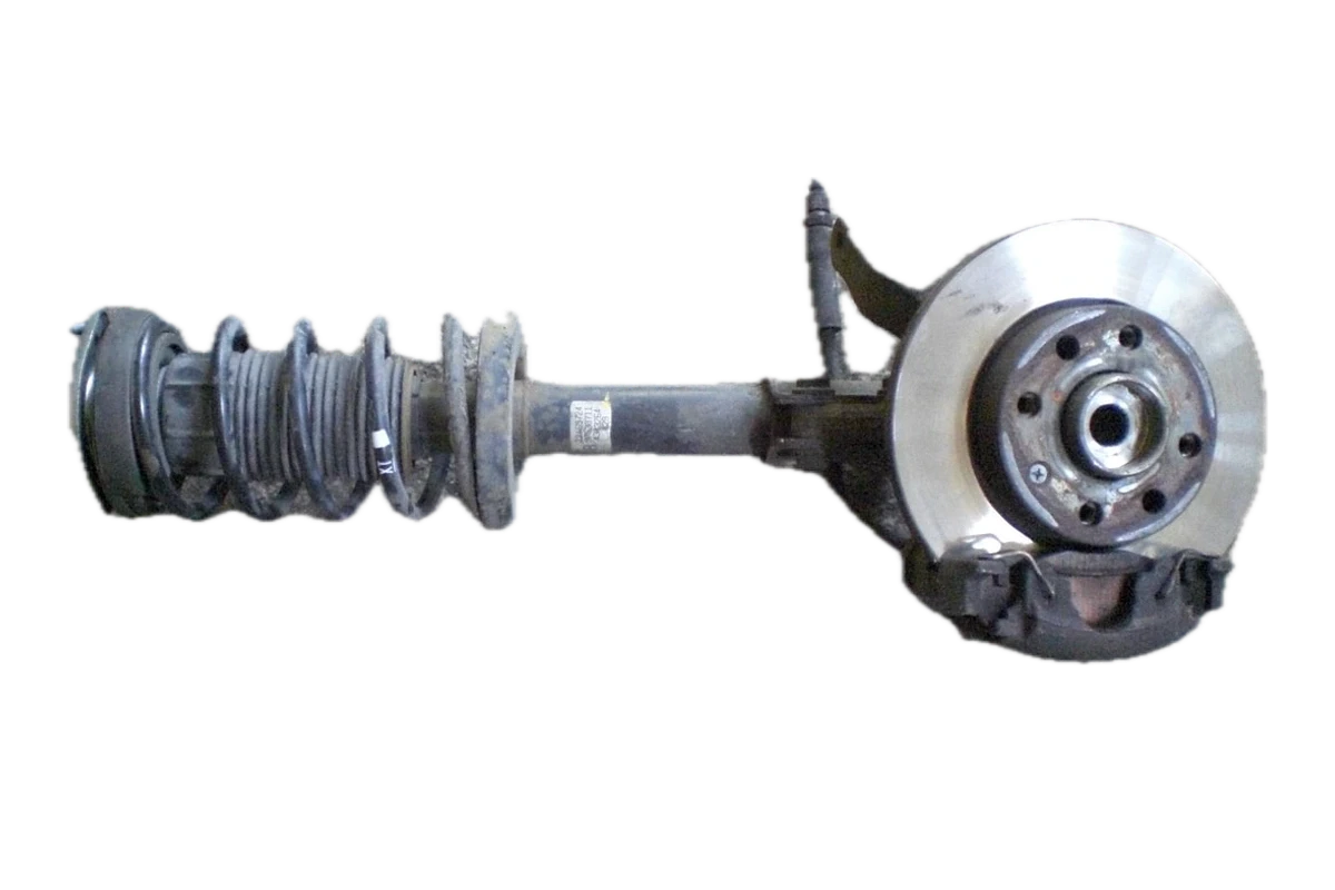 Front strut, hub, brake, and steering knuckle assembly